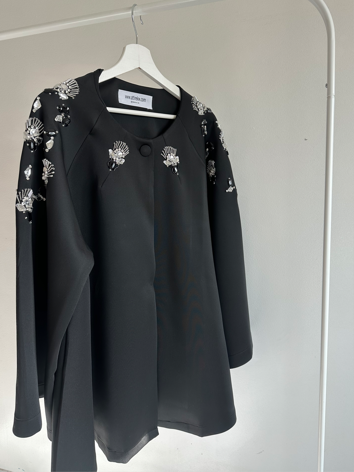 Black and embillished cape