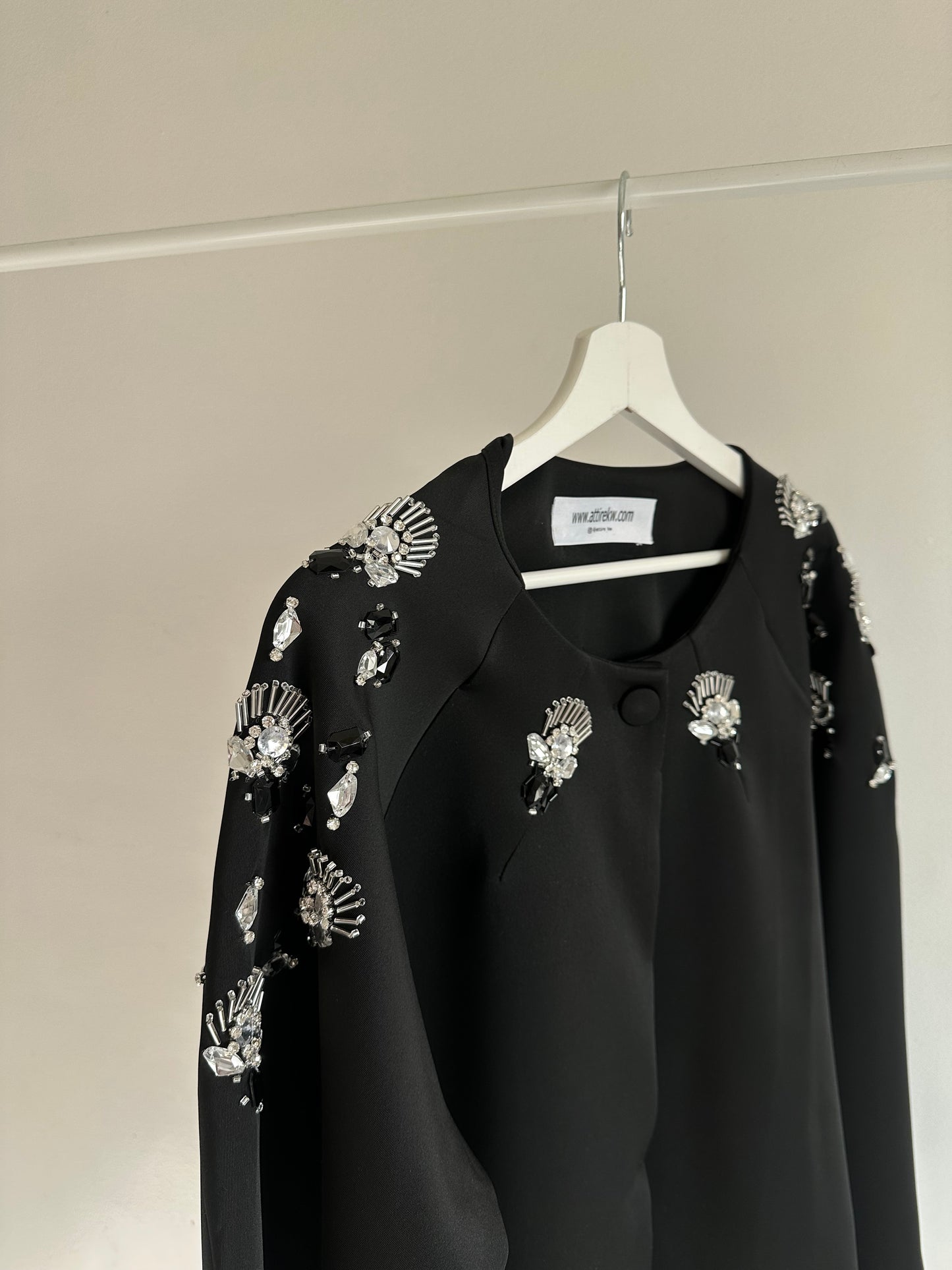 Black and embillished cape
